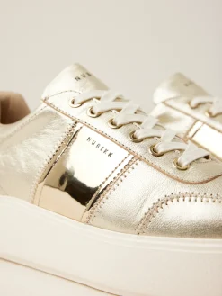 DAMES Nubikk Elise Wing Gouden Sneakers Voor Dames